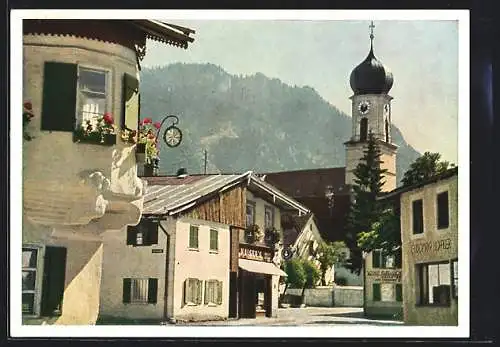 AK Oberammergau, Strassenpartie mit Kaisers Geschäft und Kirche