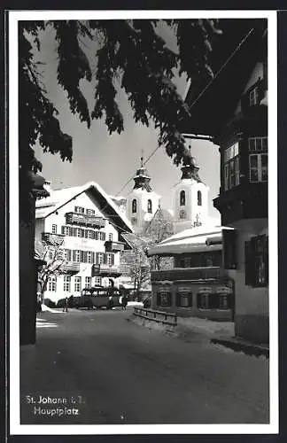 AK St. Johann i. T., Hauptplatz und Post im Schnee