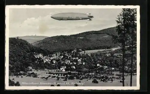 AK Falkenstein i. Ts., Teilansicht mit Luftschiff Hindenburg in der Luft