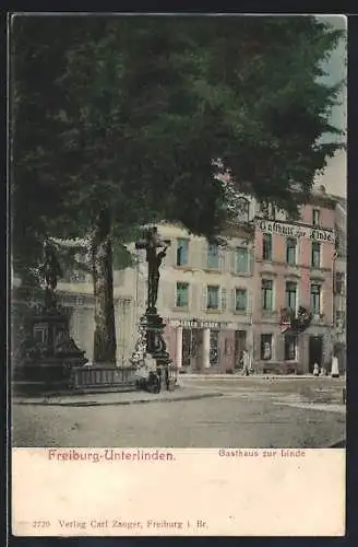 AK Freiburg-Unterlinden / Breisgau, Gasthaus zur Linde, mit Kreuzigungs-Statue u. Brunnen