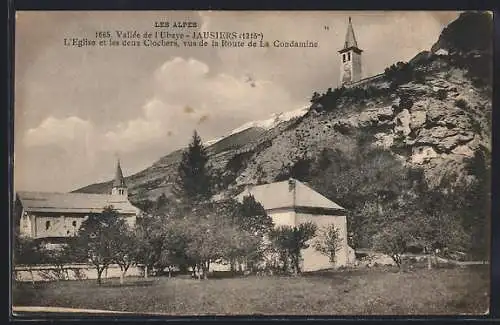 AK Jausiers, Les Alpes, Vallée de l`Ubaye, L`Eglise et les deux Clochers vus de la Route de La Condamine