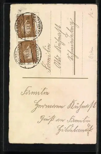 AK Osterhasen sitzen auf einer Frühlingswiese