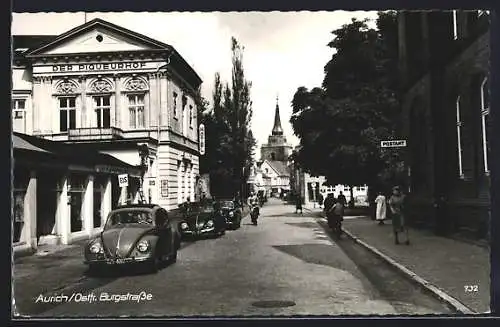 AK Aurich /Ostfr., Partie in der Burgstrasse, mit Cafe, VW-Käfer, Postamt, Piqueurhof