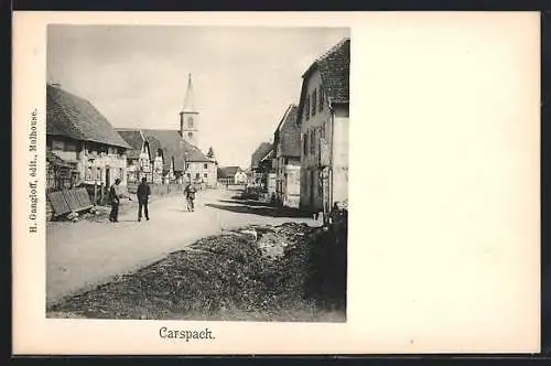 AK Carspach, Strassenpartie mit Kirche