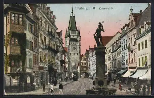 Goldfenster-AK Freiburg / Breisgau, Blick in die Kaiserstrasse