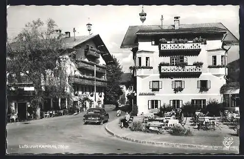 AK Kaprun, Ortspartie mit Strassencafe