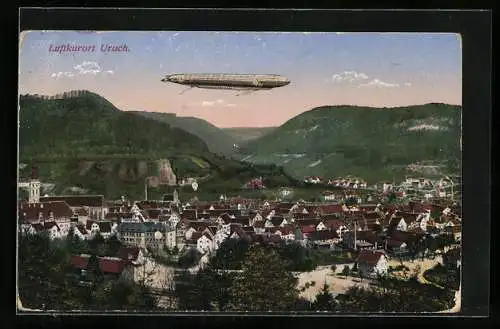 AK Urach / Württbg., Zeppelin über dem Ort