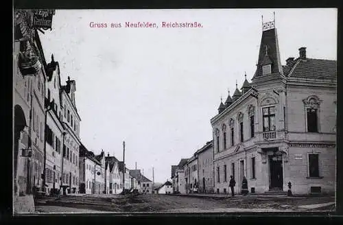 AK Neufelden, Reichsstrasse an J. Eggls Gasthaus