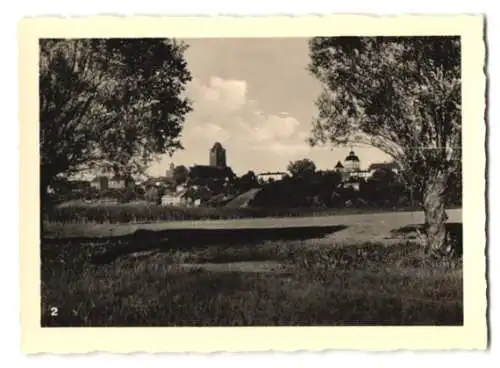 12 Fotografien unbekannter Fotograf, Ansicht Riesenburg / Westpreussen, Marktplatz, Bahnhof, Heldendenkmal, Strassen u.a