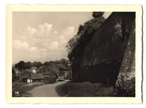 12 Fotografien unbekannter Fotograf, Ansicht Riesenburg / Westpreussen, Marktplatz, Bahnhof, Heldendenkmal, Strassen u.a