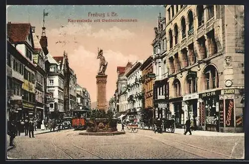 AK Freiburg i. Br., Kaiserstrasse mit Bertholdsbrunnen, Strassenbahn