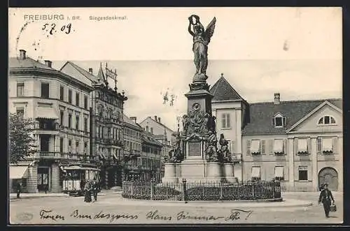 AK Freiburg i. Br., Strassenbahn am Siegesdenkmal