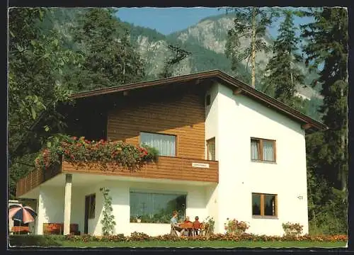 AK Münster /Tirol, Das Gasthaus Kocher gegen die Berge