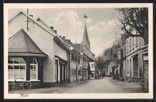 AK Wiehl, Strassenpartie mit Geschäften und Kirchturm, Wintergarten