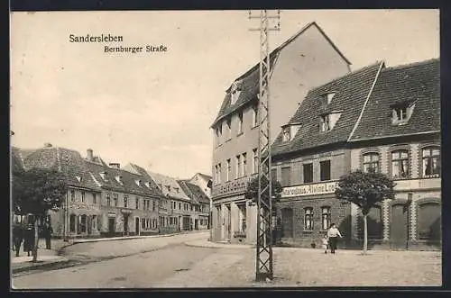 AK Sandersleben, Gemischtwaren Adolf John in der Bernburger Strasse