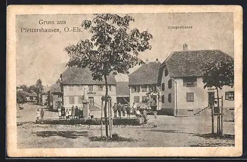 AK Pfettershausen /O.-Els., Hauptstrasse mit Brunnen