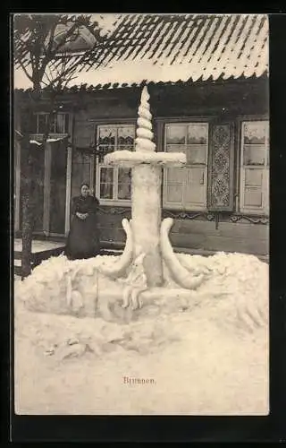 AK St. Andreasberg, Gefrorener Brunnen mit Schneeplastik am Kurhotel Schützenhaus