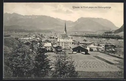 AK Kössen, Ortsansicht gegen das Kaisergebirge