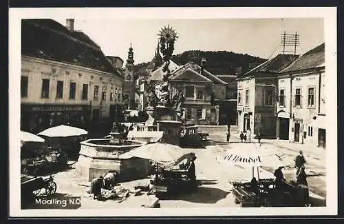 AK Mödling, Dorfplatz mit Geschäften