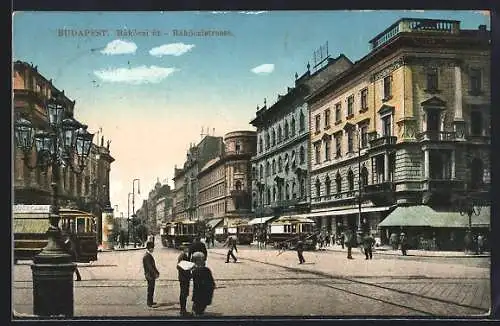 AK Budapest, Strassenbahnen fahren auf der Rakoczistrasse