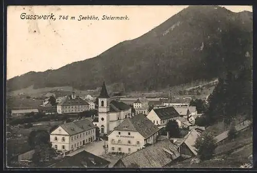 AK Gusswerk /Stmk., Ortsansicht mit Gasthof Bogensberger und Kirche aus der Vogelschau