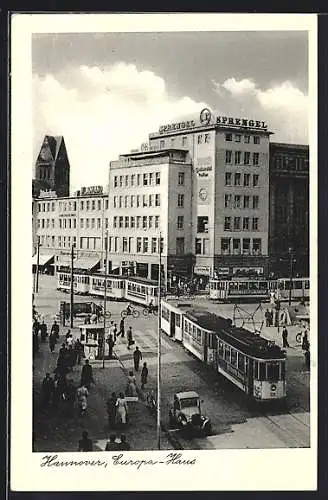 AK Hannover, Europa-Haus mit Strassenbahnen, von oben gesehen