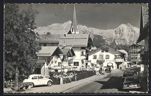 AK Seefeld /Tirol, Strassenpartie mit Café und VW-Käfer