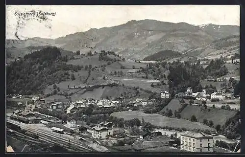 AK Schwarzach im Pongau, Blick über den Ort mit dem Bahnhof