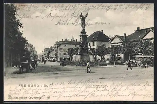 AK Freiburg / Breisgau, Siegesplatz, Ortspartie mit Blick die Strasse hinab