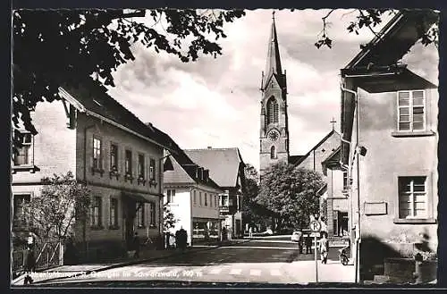 AK St. Georgen /Schwarzwald, Strassenpartie mit Kirche