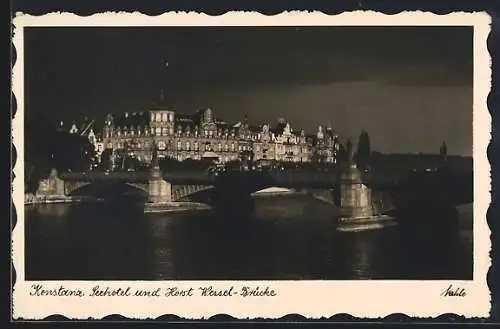 AK Konstanz, Hotel Seehotel,  Brücke bei Nacht