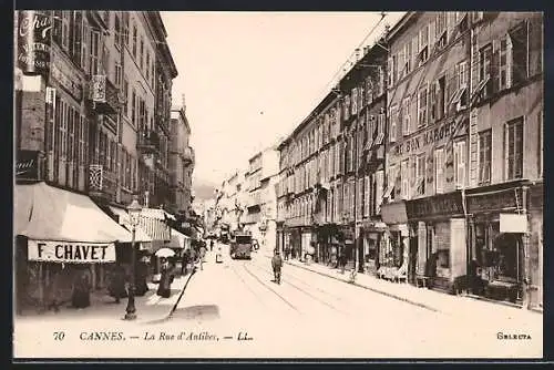 AK Cannes, La Rue d`Antibes, Strassenbahn