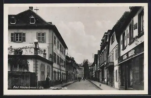 AK Bad Niederbronn i. Els., Hauptstrasse mit Geschäften