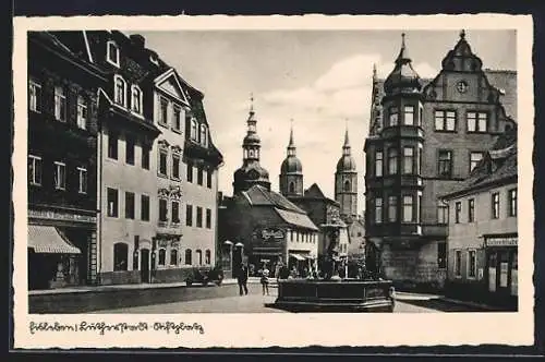 AK Eisleben, Stiftsplatz mit Geschäften und Brunnen