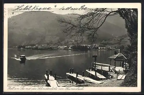 AK Zell am See, See mit Bootsstegen vor Schmittenhöhe