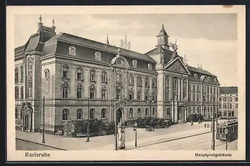 AK Karlsruhe, Hauptpostgebäude mit Strassenbahn und Litfasssäule