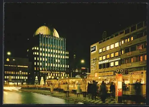 AK Hannover, Anzeiger-Hochhaus mit Geschäften bei Nacht