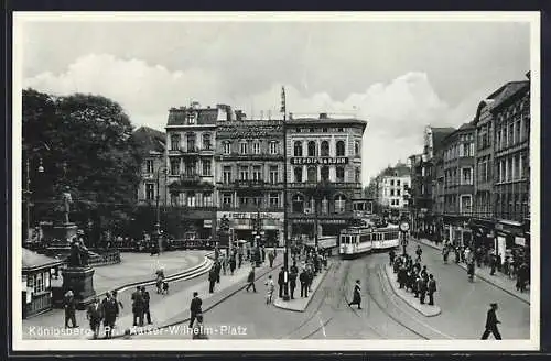 AK Königsberg, Strassenbahn bei der Anfahrt zur Haltestelle auf dem Kaiser-Wilhelm-Platz