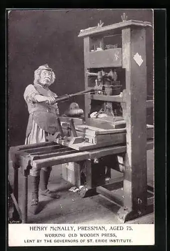 AK Henry McNally, Pressman, aged 75, working old wooden press