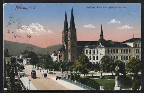 AK Freiburg i. B., Kaiserbrücke mit Johanniskirche, Strassenbahn