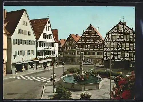 AK Leonberg /Württ., Platz mit Brunnen und Geschäften