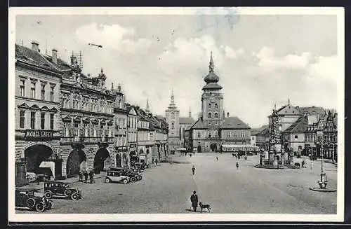 AK Saaz, Ringplatz mit Rathaus und Geschäften