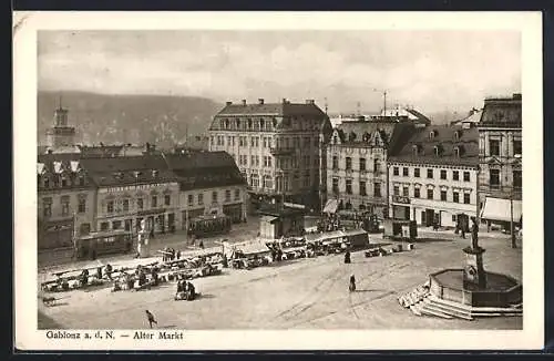 AK Gablonz / Jablonec Nad Nisou, Alter Markt mit Hotel Erlebach, Strassenbahn, Marktszene