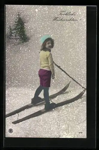 AK Kleines Mädchen auf Skiern im Schnee, Weihnachtsgruss