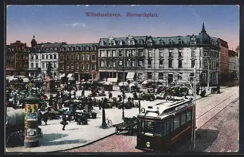 AK Wilhelmshaven, Strassenbahn und Litfasssäule am Bismarckplatz