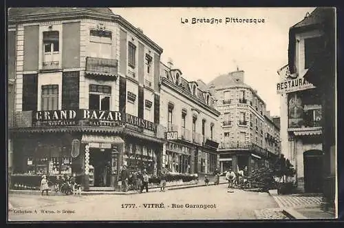 AK Vitré, Rue Garangeot avec le Grand Bazar et un restaurant