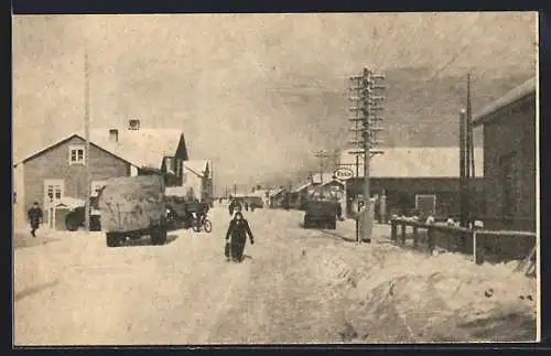 AK Lappi, Strassenszene mit Essotankstelle im Winter