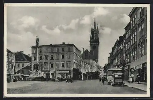 AK Znaim a. Thaya,  Platz, Geschäfte und Denkmal