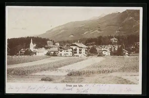 Foto-AK Fritz Gratl: Igls, Ortsansicht mit Feldern und Berghängen