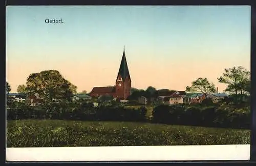 Goldfenster-AK Gettorf, Ortsansicht, Kirche und Gebäude mit leuchtenden Fenstern